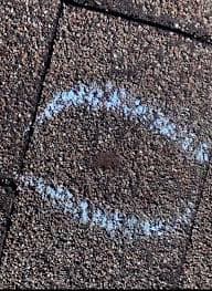Hail damage on a residential roof