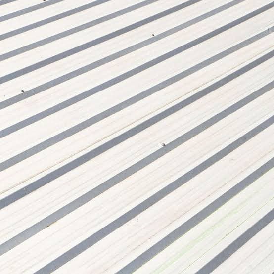 Close-up of diagonal standing seam metal roof panels