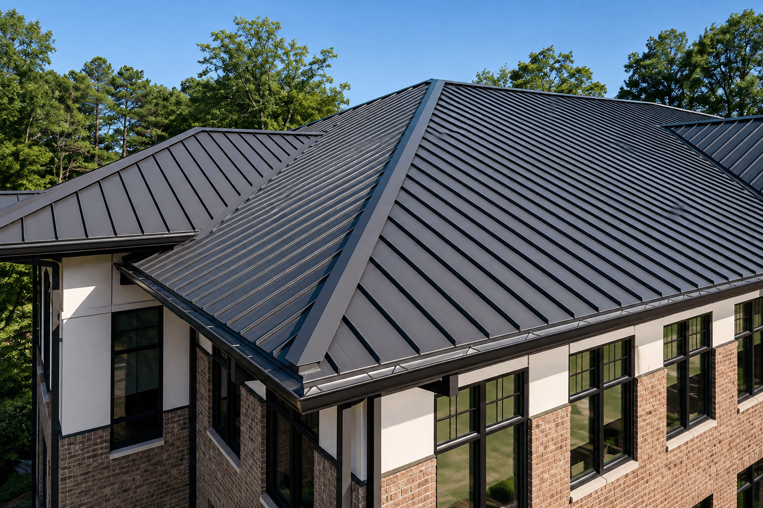 Commercial building with a grey standing seam metal roof